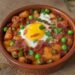 Huevos a la Flamenca (Andalusian Baked Eggs with Chorizo, Ham and Peas)